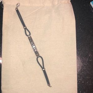 Tiffany leather and silver bracket - 7 3/4”